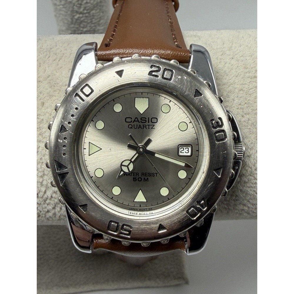 Casio Quartz Watch with Silver Dial and Brown Strap